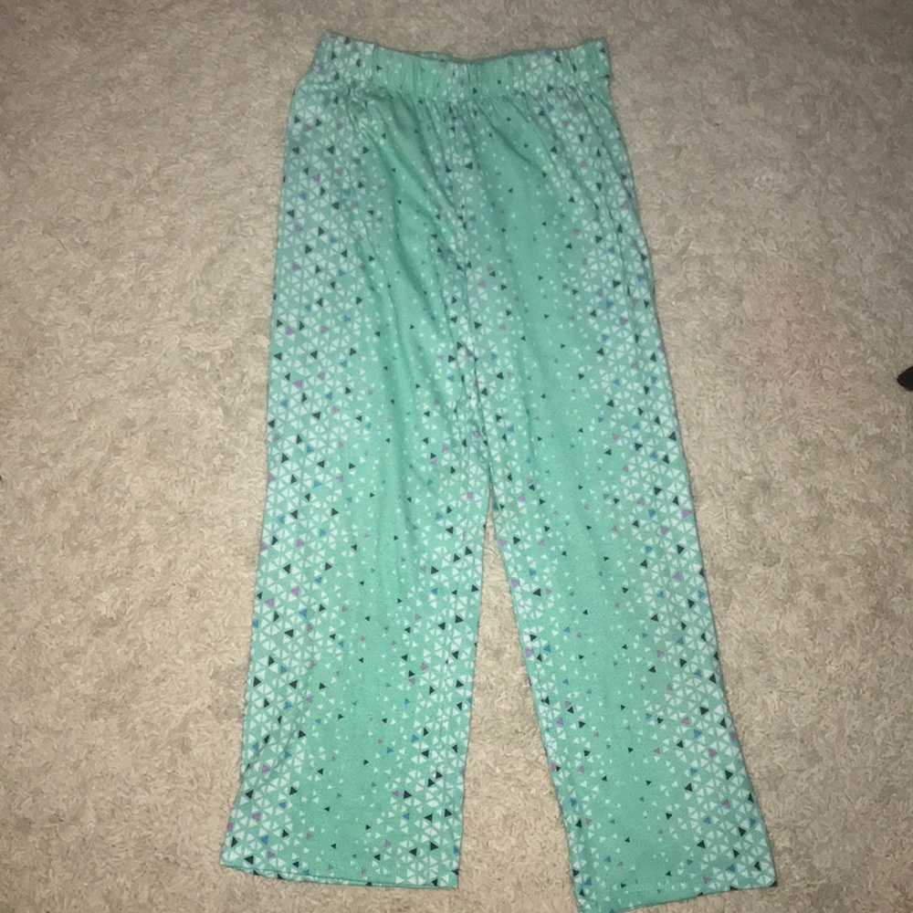 Blue pj bottoms they have triangles all over .